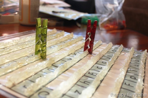 Easy Clothespin Board made with Hot glue and sheet protector