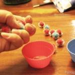 Using pom poms and cups for in hand manipulation