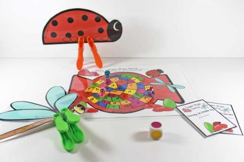 Great clothespin game to work on fine motor skills. put the legs (clothespins) on the bugs.