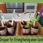 Using a squeeze bulb for fine motor gardening